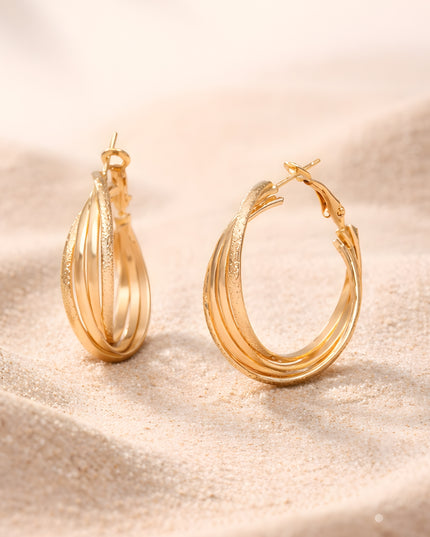 Twist Edge Gold Hoops